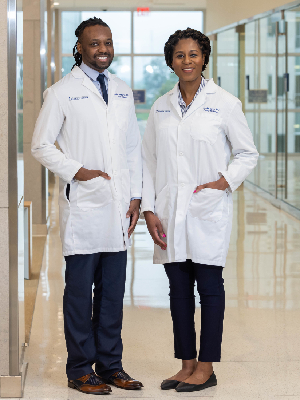 A portrait of UMMC Family Medicine Residency program chief residents, Charles Chatman, Jr., MD and Nneka Agum, MD 